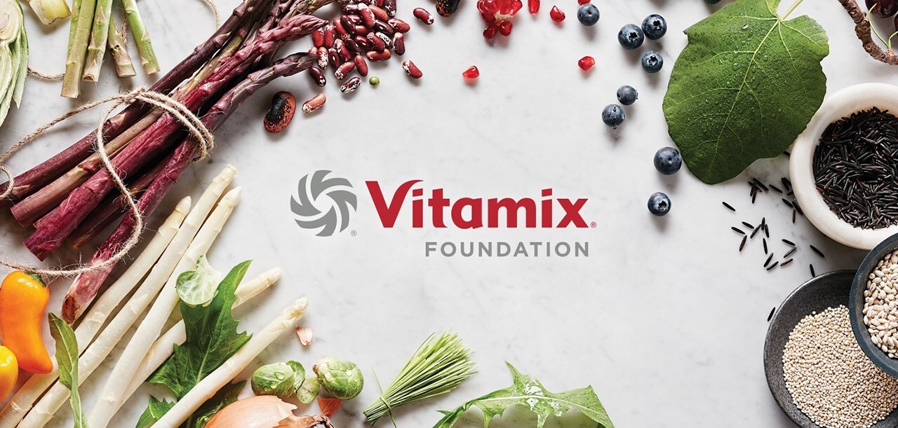 Vitamix Foundation Logo with Healthy Foods