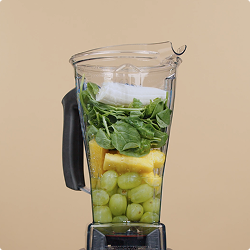 stacking fruit in blender container