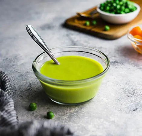 Purée pour bébé au cari de courge et aux petits pois