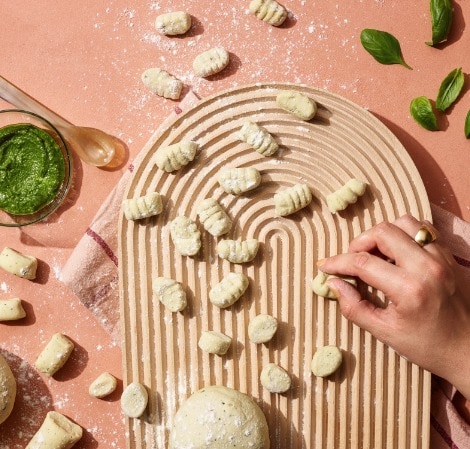 vegan basil ricotta gnocchi on cutting board