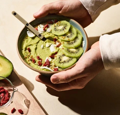 bowl of avocado smoothie with kiwi