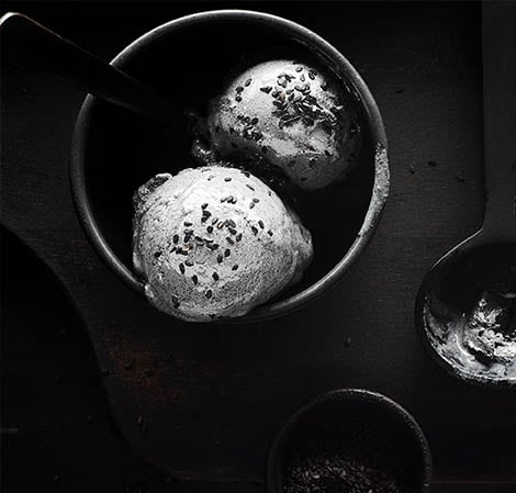 white sesame sorbet in a dark bowl