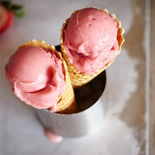 Strawberry Yogurt Freeze shown in ice cream cones