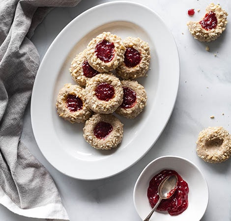 thumbprint cookies with a platter and jam on the side