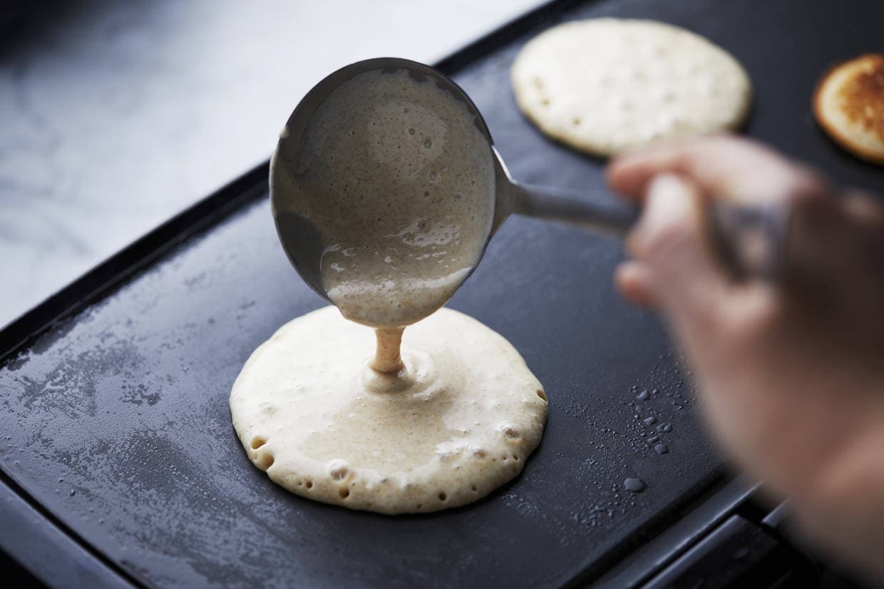 pancake batter on griddle