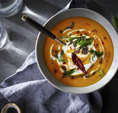 carrot curried soup in a bowl