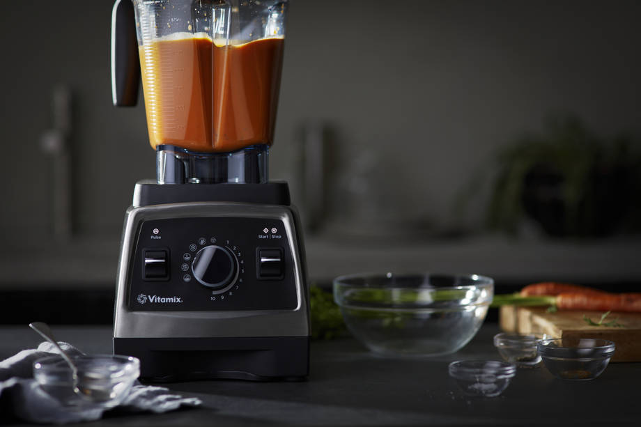 curried carrot soup in a blender container