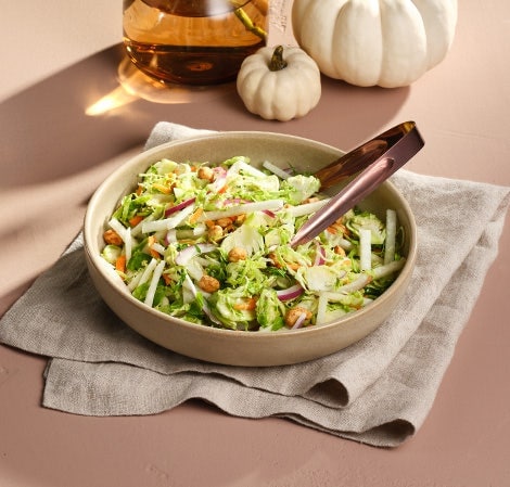 Brussels Sprouts and Jicama Slaw with Spicy Candied Peanuts